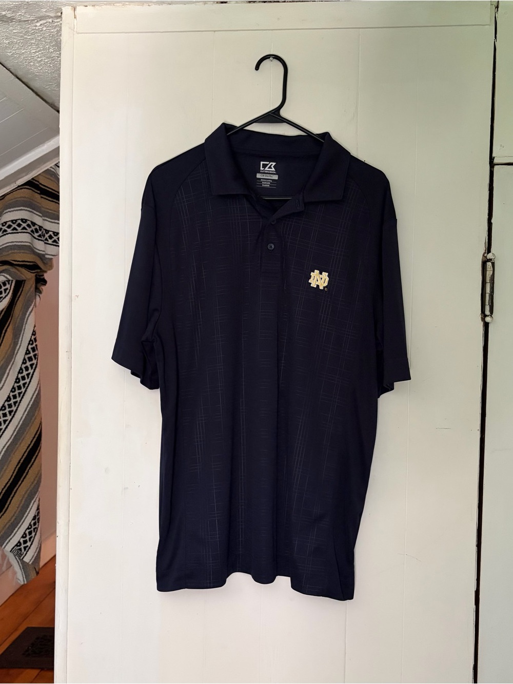 Cutter and buck brand short sleeve blue plaid athletic material golf shirt/polo